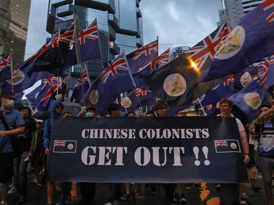 tens-of-thousands-turn-out-for-pro-democracy-march-on-anniversary-of-hong-kong-handover-photos